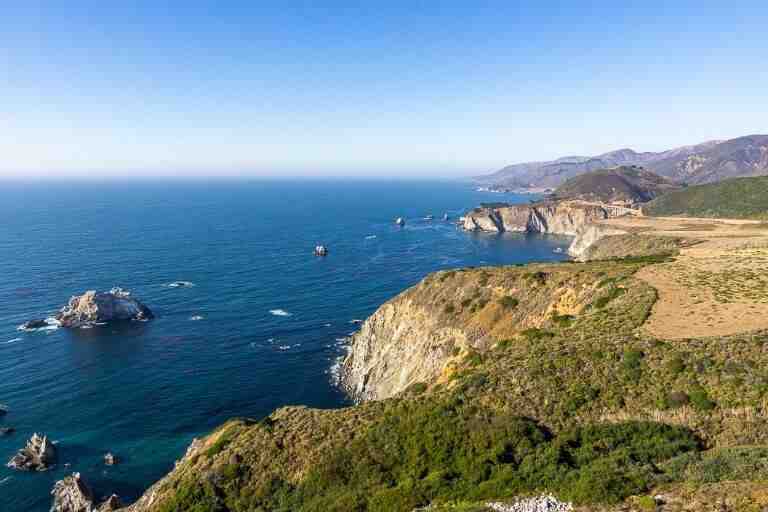 Is it better to drive up or down the California coast?